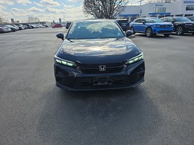2023 Honda Civic Sedan Sport CVT — rear three-quarter view