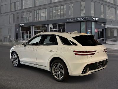 2024 Genesis GV70 — rear three-quarter view