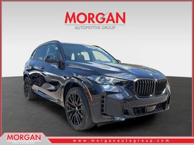 2026 BMW X5 sDrive40i in CARBON BLK MET — front three-quarter view