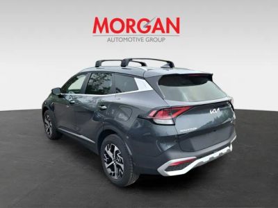 2024 Kia Sportage — rear three-quarter view