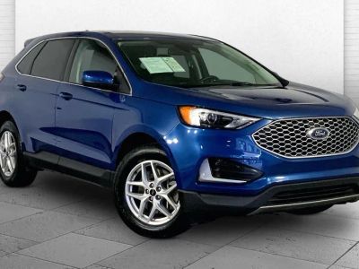 2024 Ford Edge SEL in Atlas Blue — front three-quarter view
