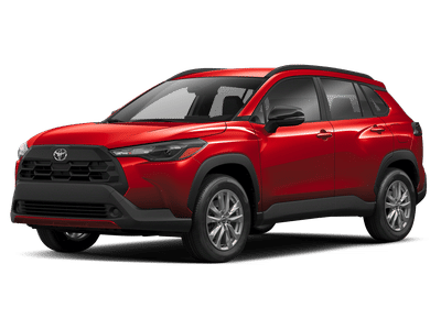 2026 Toyota Corolla Cross LE in Red — front three-quarter view