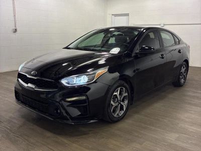 2021 Kia Forte LXS in Aurora Black — front three-quarter view