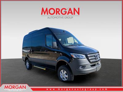 2026 Mercedes-Benz Sprinter 2500 Passenger 144 WB in Black — front three-quarter view