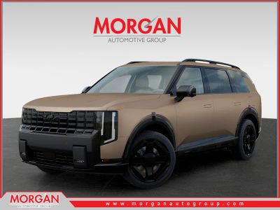 2027 Kia Telluride Hybrid X-Line SX in Terrain Brown Matte — front three-quarter view