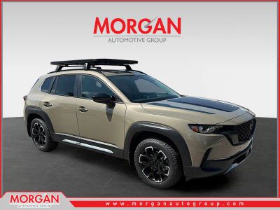 2026 Mazda CX-50 2.5 Turbo Meridian Edition in Zircon Sand Metallic — front three-quarter view