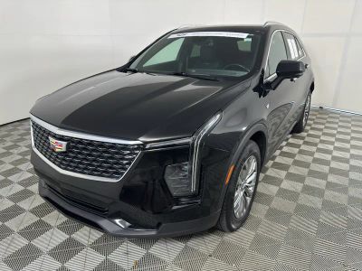 2025 Cadillac XT4 Premium Luxury in Stellar Black Metallic — front three-quarter view