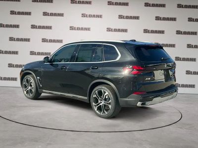 2026 BMW X5 — rear three-quarter view