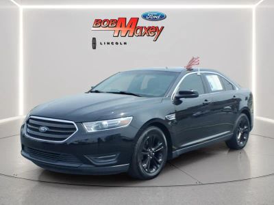 2018 Ford Taurus SEL in Shadow Black — front three-quarter view
