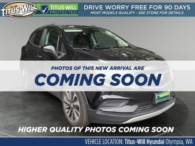 2021 Buick Encore Preferred in Ebony Twilight Metallic — front three-quarter view