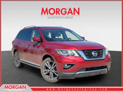 2018 Nissan Pathfinder Platinum in Scarlet Ember — front three-quarter view