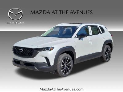 2026 Mazda CX-50 Hybrid Premium Plus in Beige — front three-quarter view