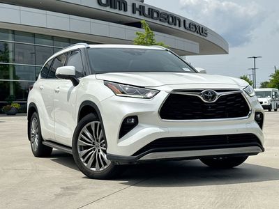 2021 Toyota Highlander Platinum in White — front three-quarter view