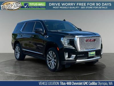 2021 GMC Yukon Denali in Onyx Black — front three-quarter view