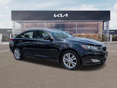 2012 Kia Optima EX in Ebony Black — front three-quarter view