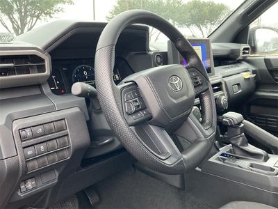 2026 Toyota Tacoma SR in Black — front three-quarter view
