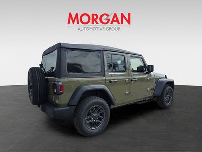 2026 Jeep Wrangler — rear three-quarter view