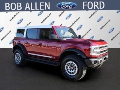 2026 Ford Bronco Outer Banks in Ruby Red — front three-quarter view