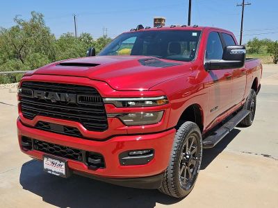 2026 RAM 2500 Laramie in Molten Red Pearlcoat — front three-quarter view