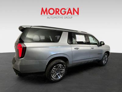 2025 Chevrolet Suburban — rear three-quarter view