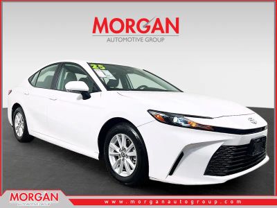 2025 Toyota Camry LE in White — front three-quarter view