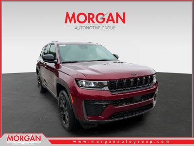 2026 Jeep Grand Cherokee Laredo Altitude in Velvet Red Pearlcoat — front three-quarter view