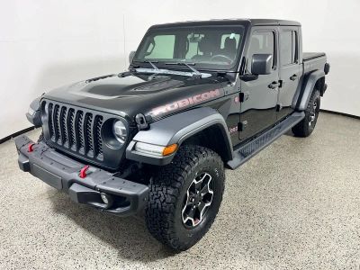 2022 Jeep Gladiator Rubicon in Black Clearcoat — front three-quarter view