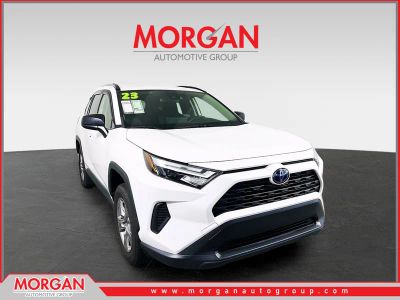2023 Toyota RAV4 Hybrid LE in White — front three-quarter view