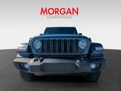 2026 Jeep Wrangler — rear three-quarter view
