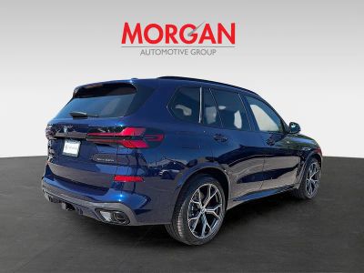 2026 BMW X5 — rear three-quarter view