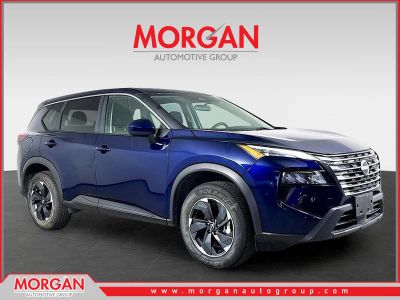 2024 Nissan Rogue SV in Deep Ocean Blue — front three-quarter view