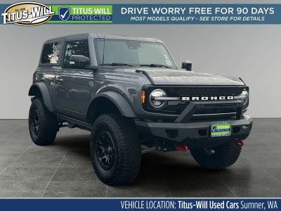 2021 Ford Bronco Wildtrak *Lifted* in Lightning Blue Metallic — front three-quarter view