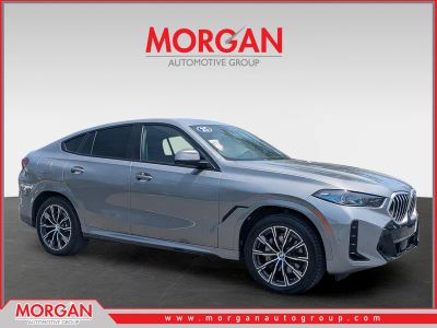 2025 BMW X6 xDrive40i in Gray — front three-quarter view
