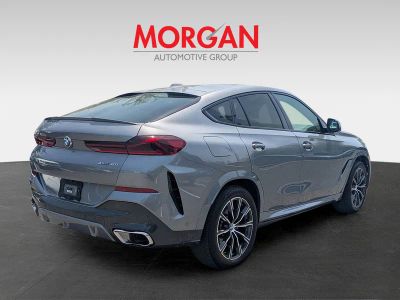 2025 BMW X6 — rear three-quarter view