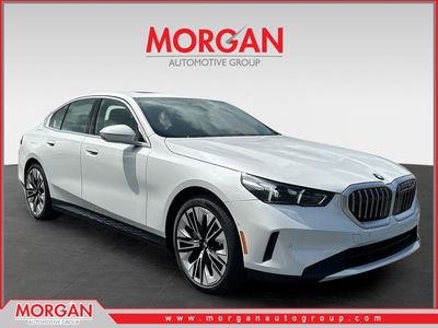 2026 BMW 5 Series 530i in White — front three-quarter view