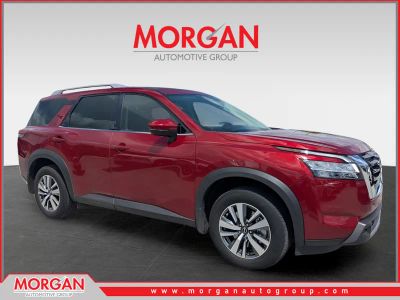 2024 Nissan Pathfinder SL in Red — front three-quarter view