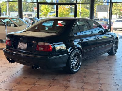2002 BMW M5 — rear three-quarter view