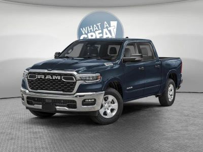 2026 RAM 1500 RAM 1500 BIG HORN CREW CAB 4X4 5'7' BOX in Forged Blue Metallic Exterior Paint — front three-quarter view