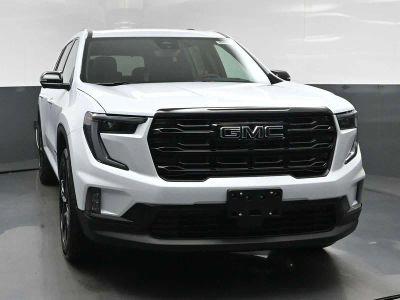 2026 GMC Acadia Elevation in Glacier White Tricoat — front three-quarter view