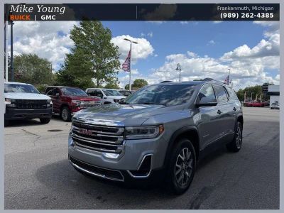 2023 GMC Acadia SLE in Sterling Metallic — front three-quarter view