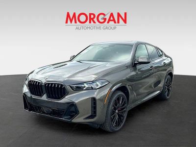 2027 BMW X6 — rear three-quarter view