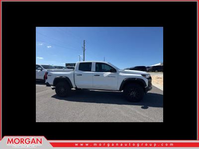 2023 Chevrolet Colorado Trail Boss in White — front three-quarter view