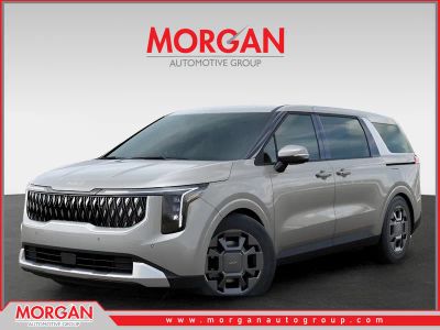 2026 Kia Carnival Hybrid EX in Silver — front three-quarter view