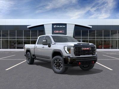 2026 GMC Sierra 2500 HD AT4X in Sterling Metallic — front three-quarter view