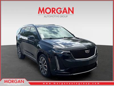 2023 Cadillac XT6 AWD Sport in Stellar Black Metallic — front three-quarter view