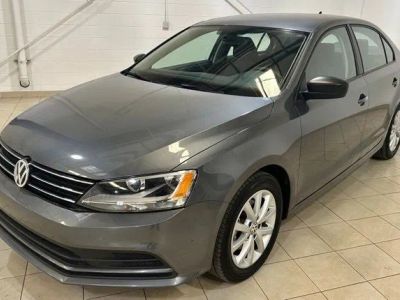 2015 Volkswagen Jetta 1.8T SE in Platinum Gray Metallic — front three-quarter view