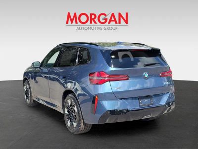 2026 BMW X3 — rear three-quarter view