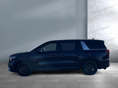2026 Kia Carnival — rear three-quarter view