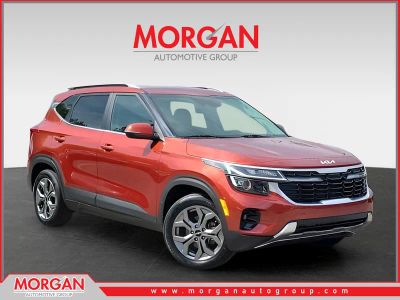 2024 Kia Seltos S in Orange — front three-quarter view