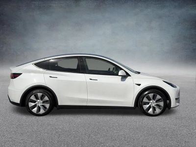 2023 Tesla Model Y — side profile view